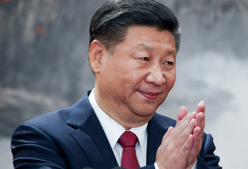 China's Xi Jinping rubbing his hands
